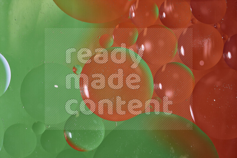 Close-ups of abstract oil bubbles on water surface in shades of green and red