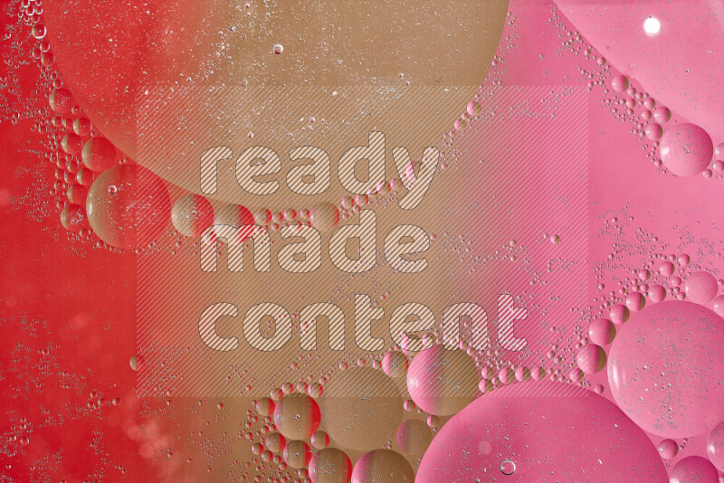 Close-ups of abstract oil bubbles on water surface in shades of brown, red and pink