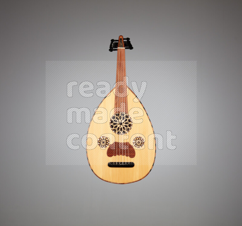 a wooden brown Oud on a gray background