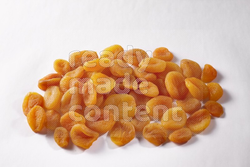 Dried apricots on white background