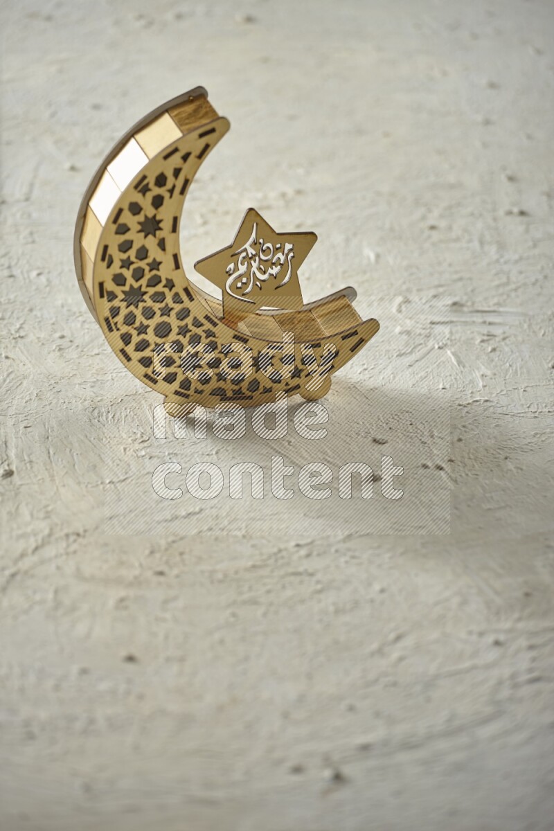 A lantern placed on a textured white background