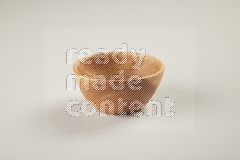 Wooden bowl on white background