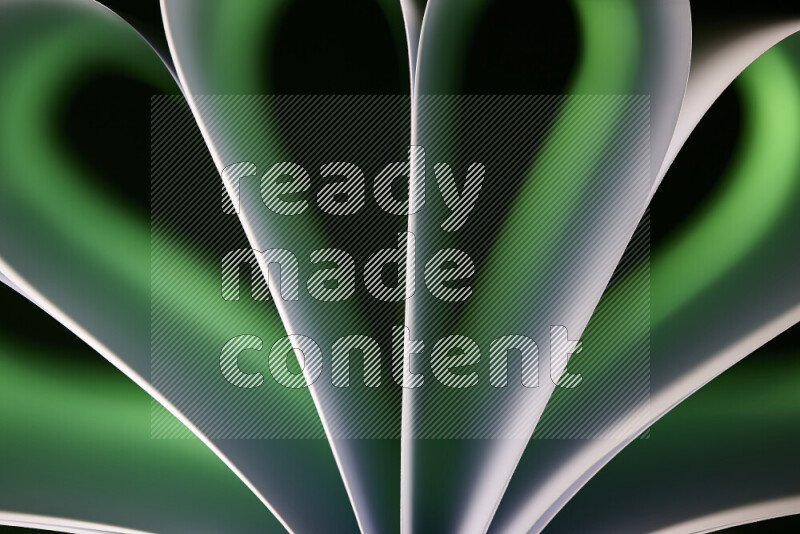 An abstract art piece displaying smooth curves in green and orange gradients created by colored light