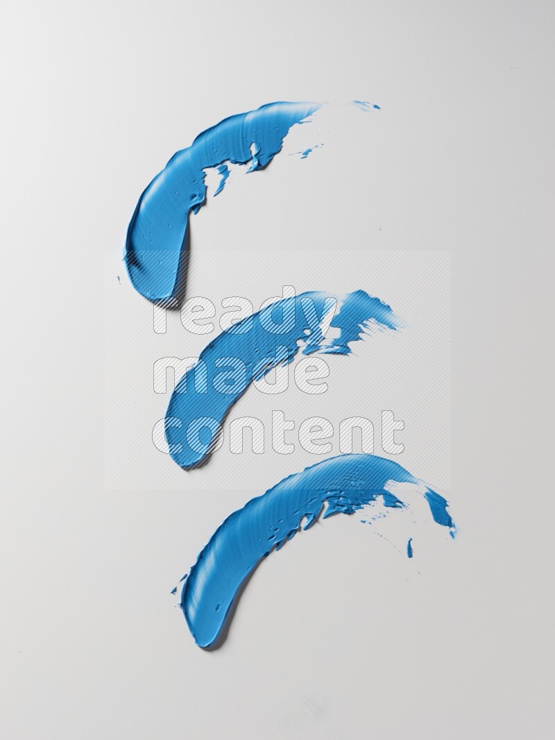 Blue painting knife strokes on white background