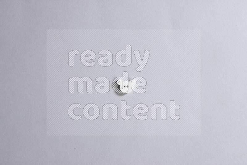 One colored button on grey background