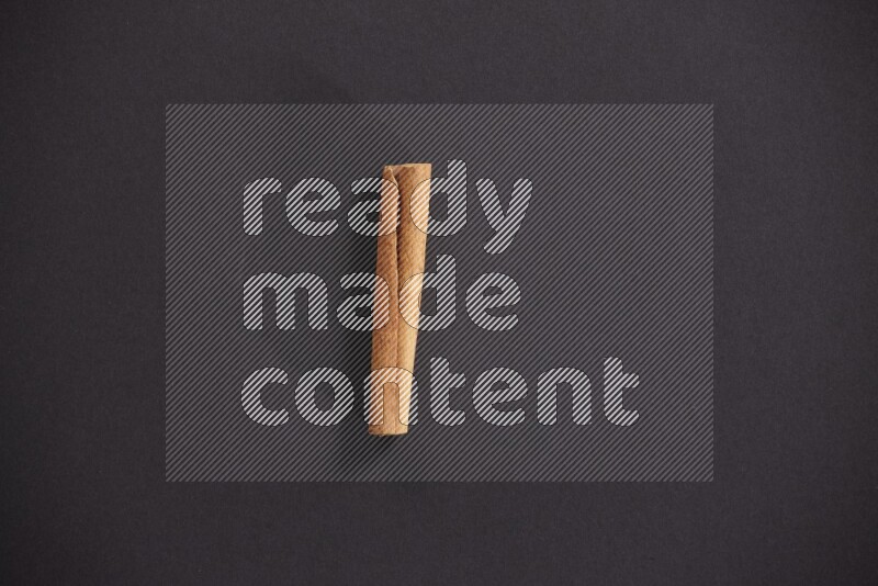Cinnamon stick on black background