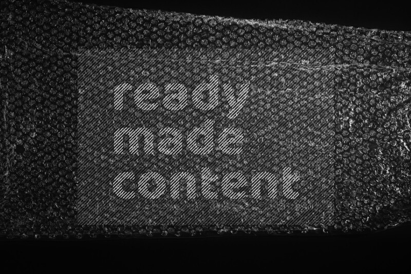 Bubble wrap texture on black background