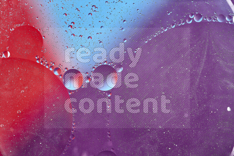 Close-ups of abstract oil bubbles on water surface in shades of blue, red and purple
