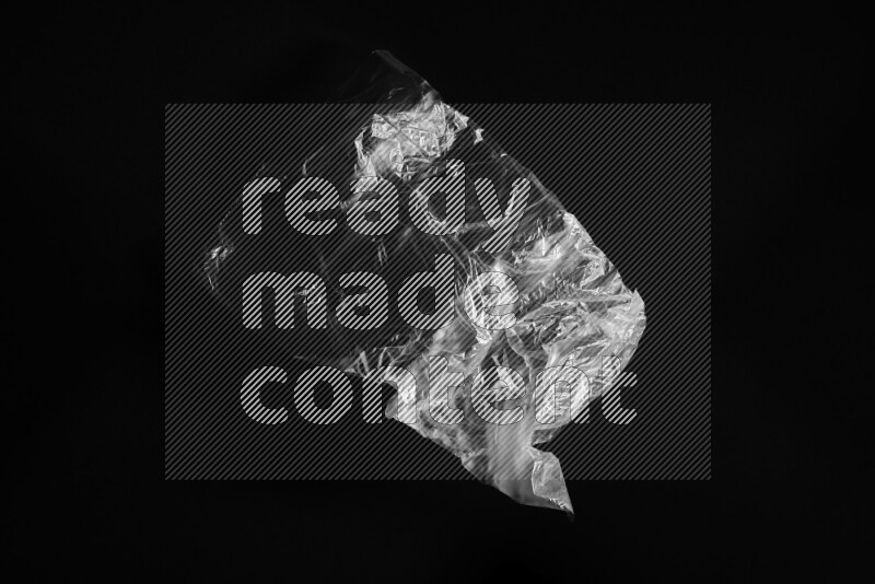 Transparent plastic textures on black background