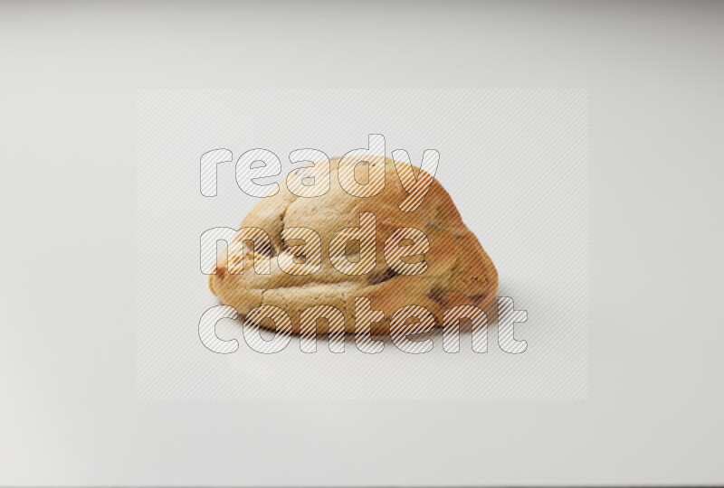 a chocolate chip cookie on a white background