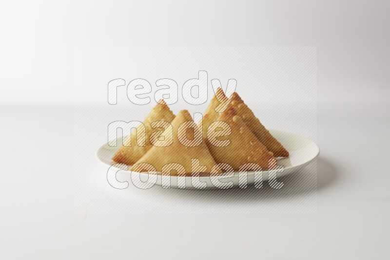 sambosas on a white background