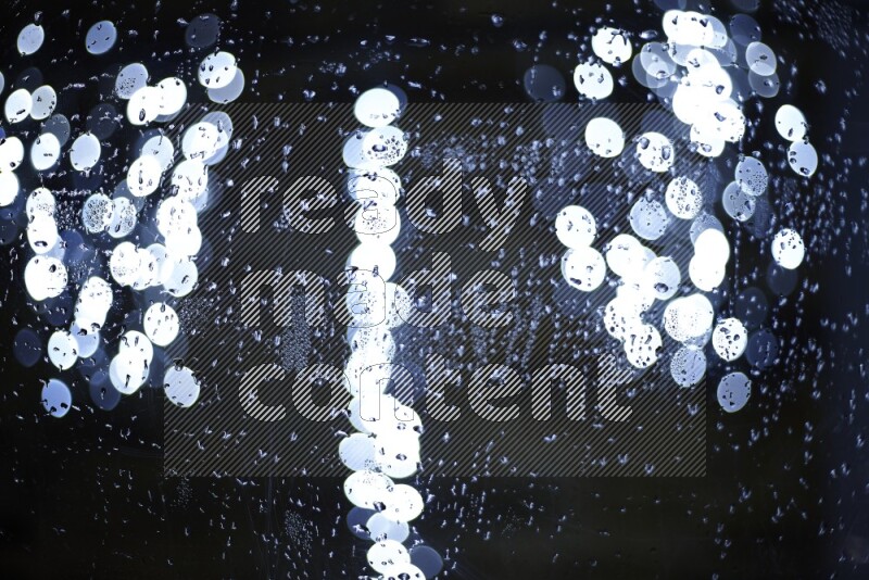 Bokeh light in white with water drops