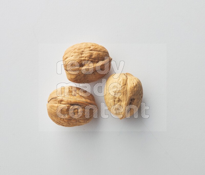 Top-view shot of walnut on white background