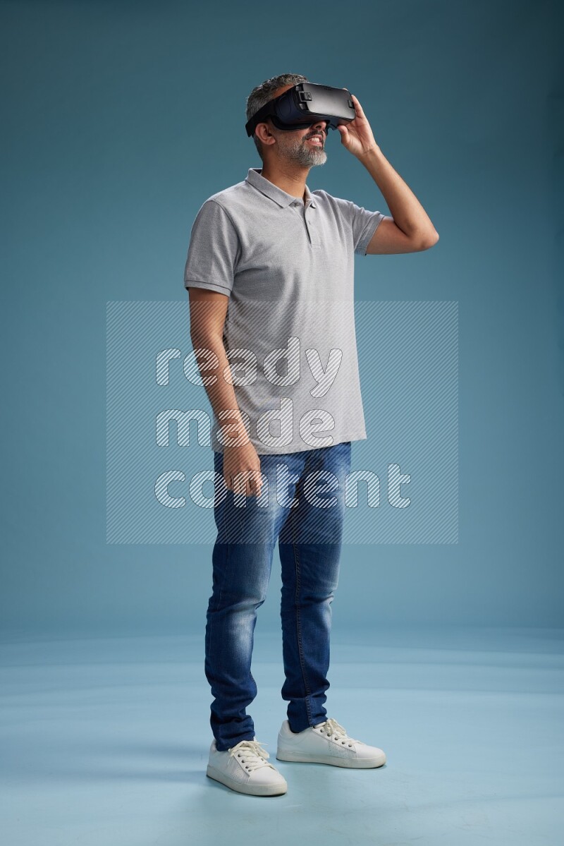 Man Standing Gaming with VR