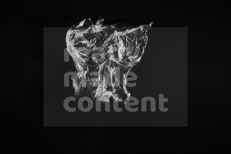 Transparent plastic textures on black background