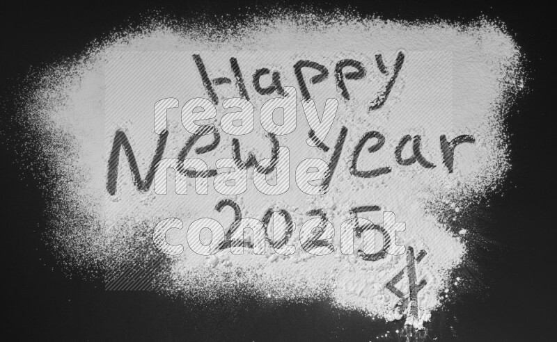 A sentence written with powder on black background