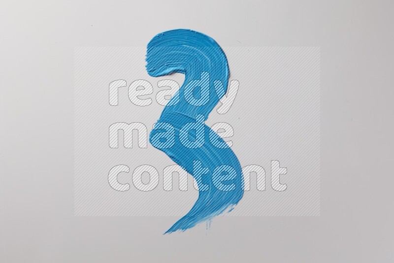 A single blue zigzag brush stroke on a white background