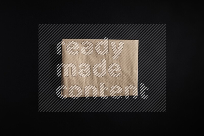 Craft paper on black background