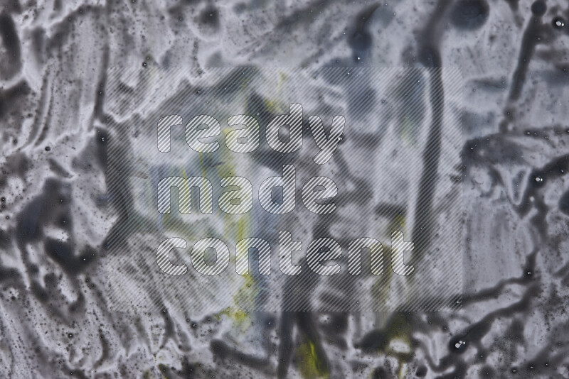 Abstract colorful background with mixed of blue, black and yellow paint colors