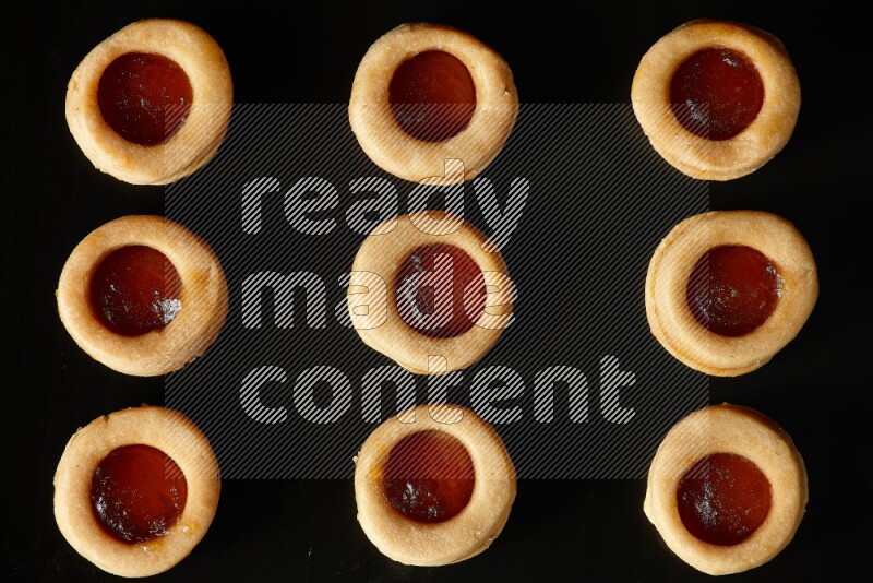 Jam cookies on a black background