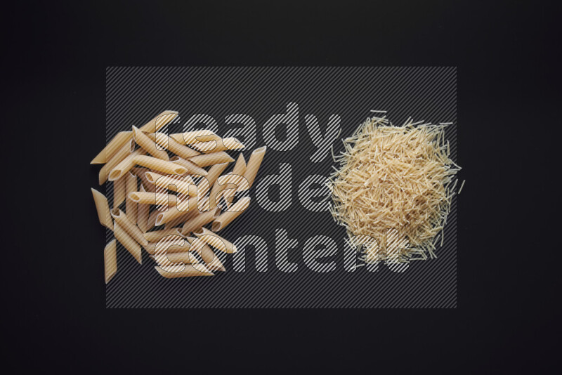 Different pasta types in bunches on black background