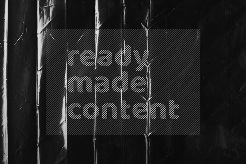 Plastic surface texture on dark background