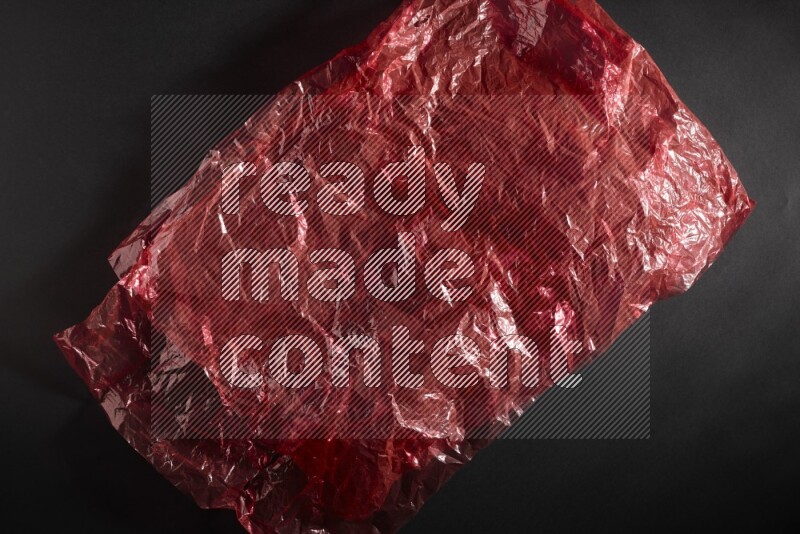 Colored plastic textures on black background