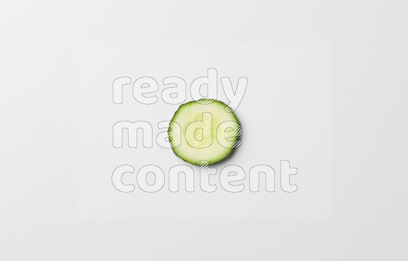 A cucumber slice on white background