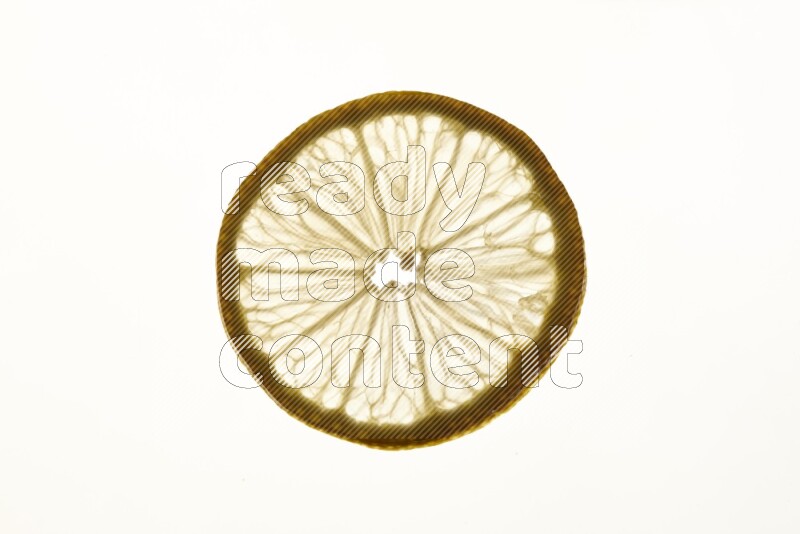 Lemon slices on illuminated white background