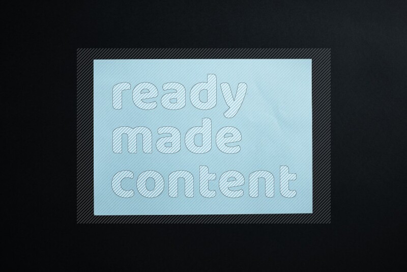 Blue paper sheet on black background