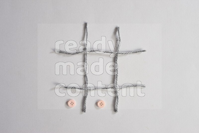 Rose buttons placed on grey background