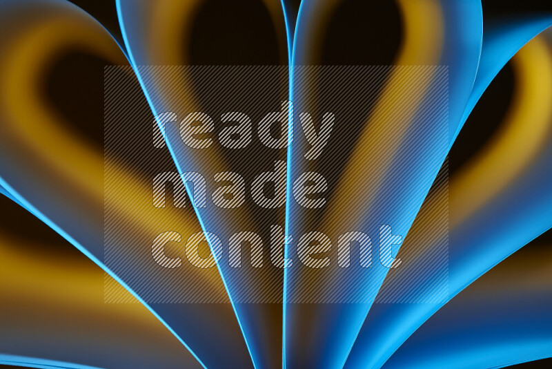 An abstract art piece displaying smooth curves in yellow and blue gradients created by colored light