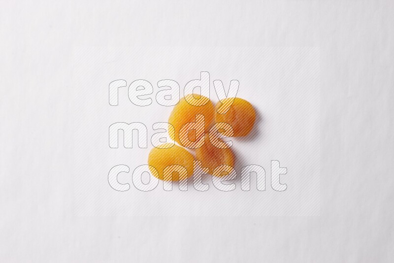 Dried apricots on white background