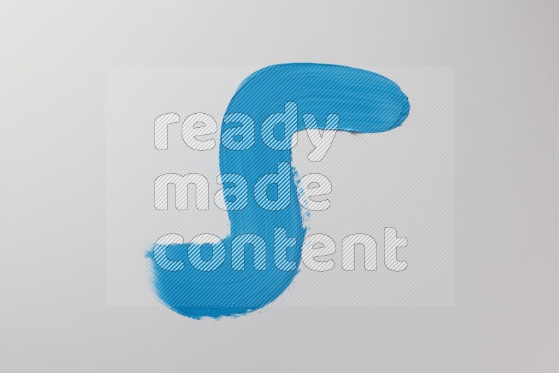 A single blue S curved brush stroke on a white background