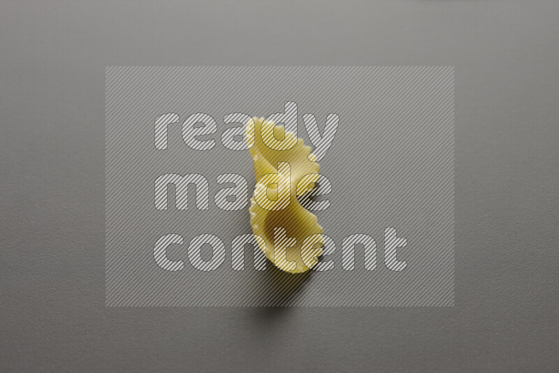 Fiocchi pasta on grey background