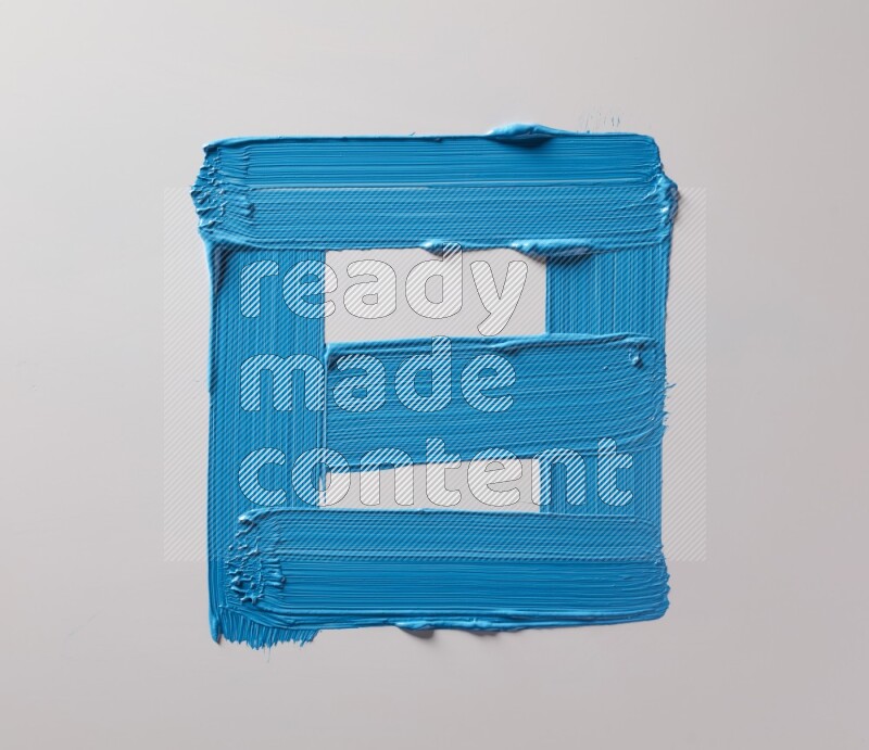 Multi blue straight brush strokes in different shapes on a white background