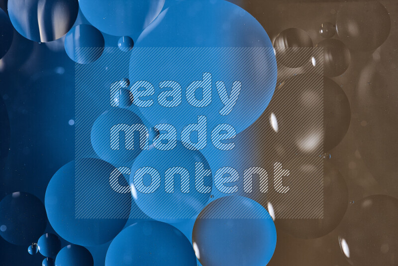 Close-ups of abstract oil bubbles on water surface in shades of blue and brown