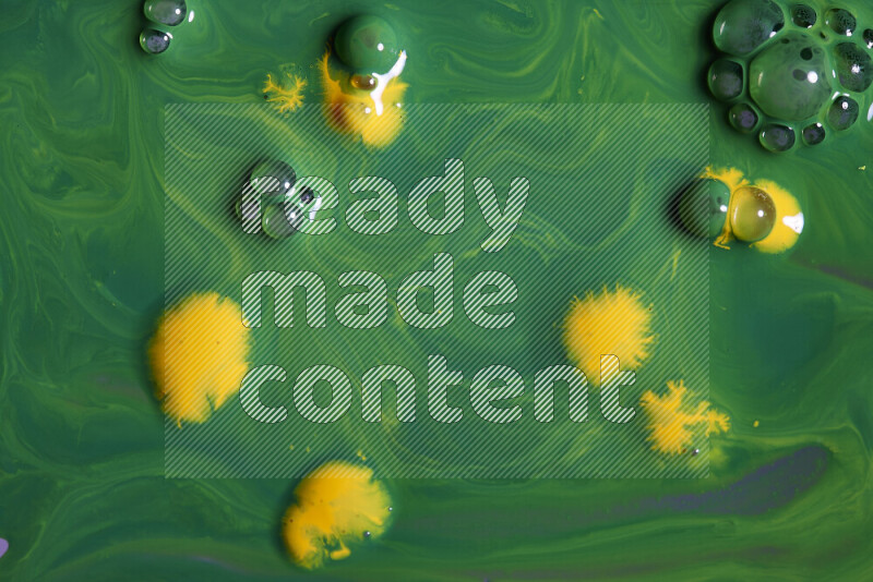 خلفية ملونة مع مزيج من ألوان الطلاء الأخضر والأصفر