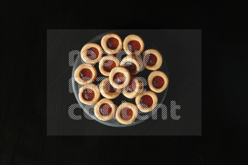 Jam cookies on a black background