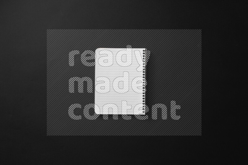 Notebook sheet on black background