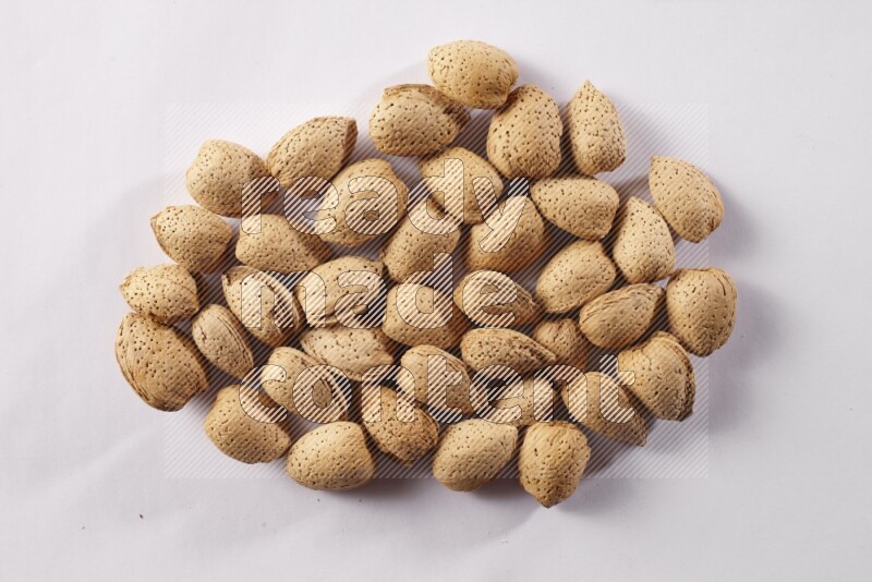 Almonds on white background