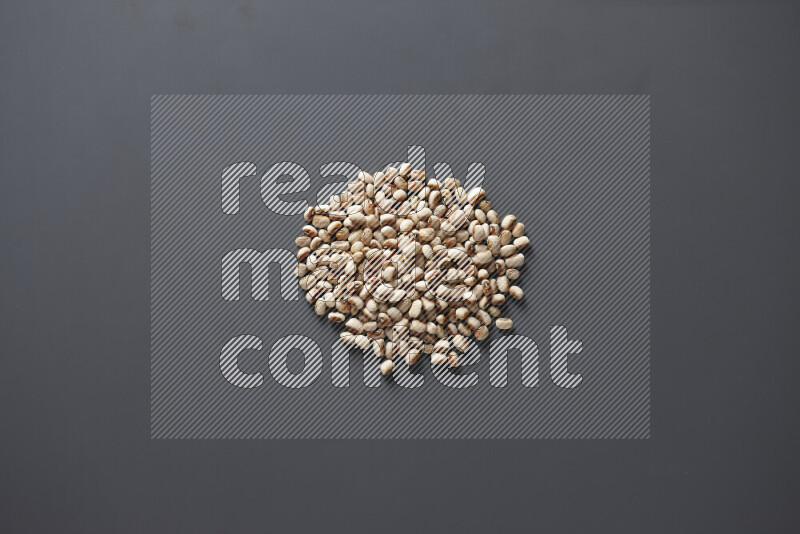 Black-eyed peas on grey background