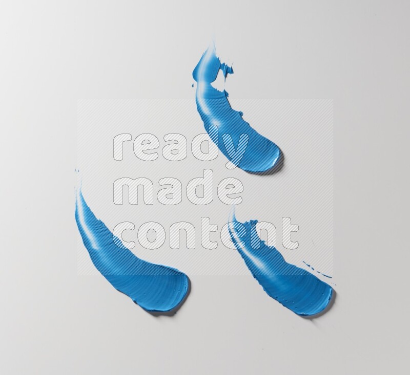 Blue painting knife strokes on white background