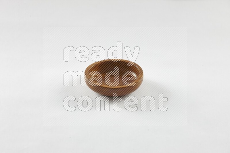 A wooden bowl on white background