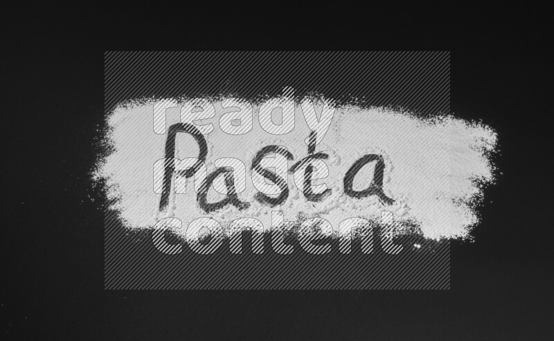 A word written with powder on black background