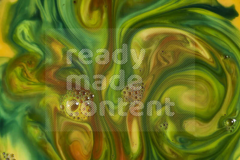 A close-up of abstract swirling patterns in orange, green and red