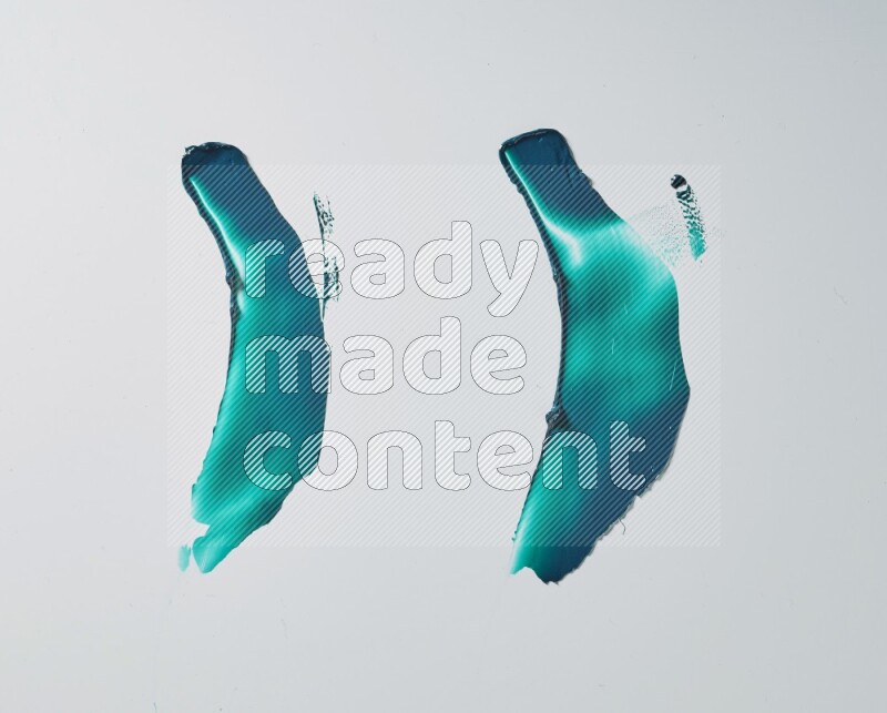 Turquoise curved painting knife strokes on white background