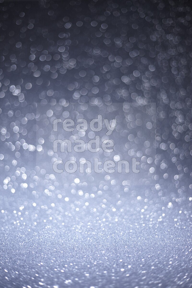 Silver glittery bokeh background