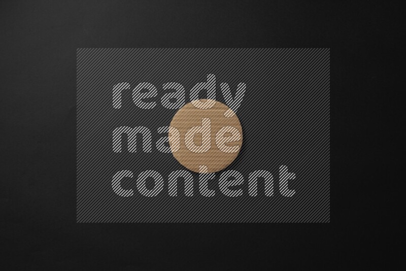 Cardboard in shapes on black background