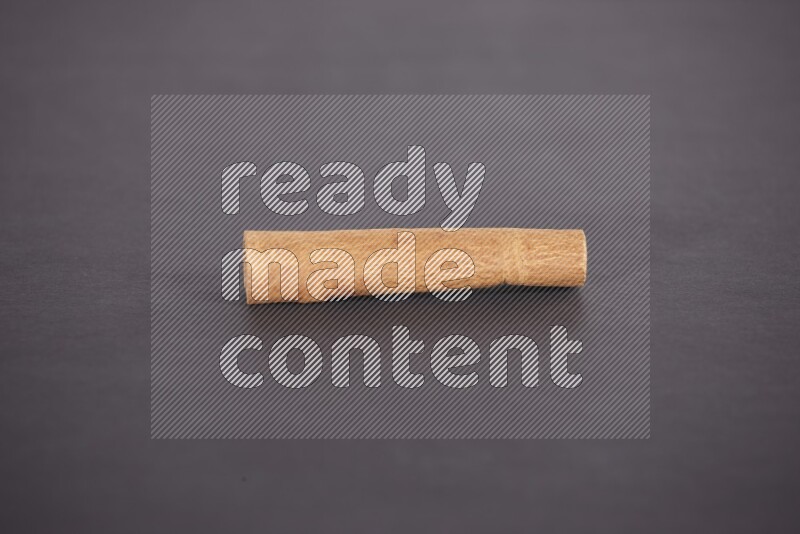 Cinnamon stick on black background